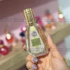 بطری 50 میل عطر زنانه لالیک لامور | Lalique L’Amour فرگرانس ورد (آمور د لوکس) با طراحی شیک در پس‌زمینه‌ای مینیمال.