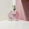 بطری ۲۵ میل عطر شنل چنس اوتندر-صورتی اسمارت | Chanel Chance Eau Tendre با طراحی کوچک و صورتی براق در پس‌زمینه‌ای روشن